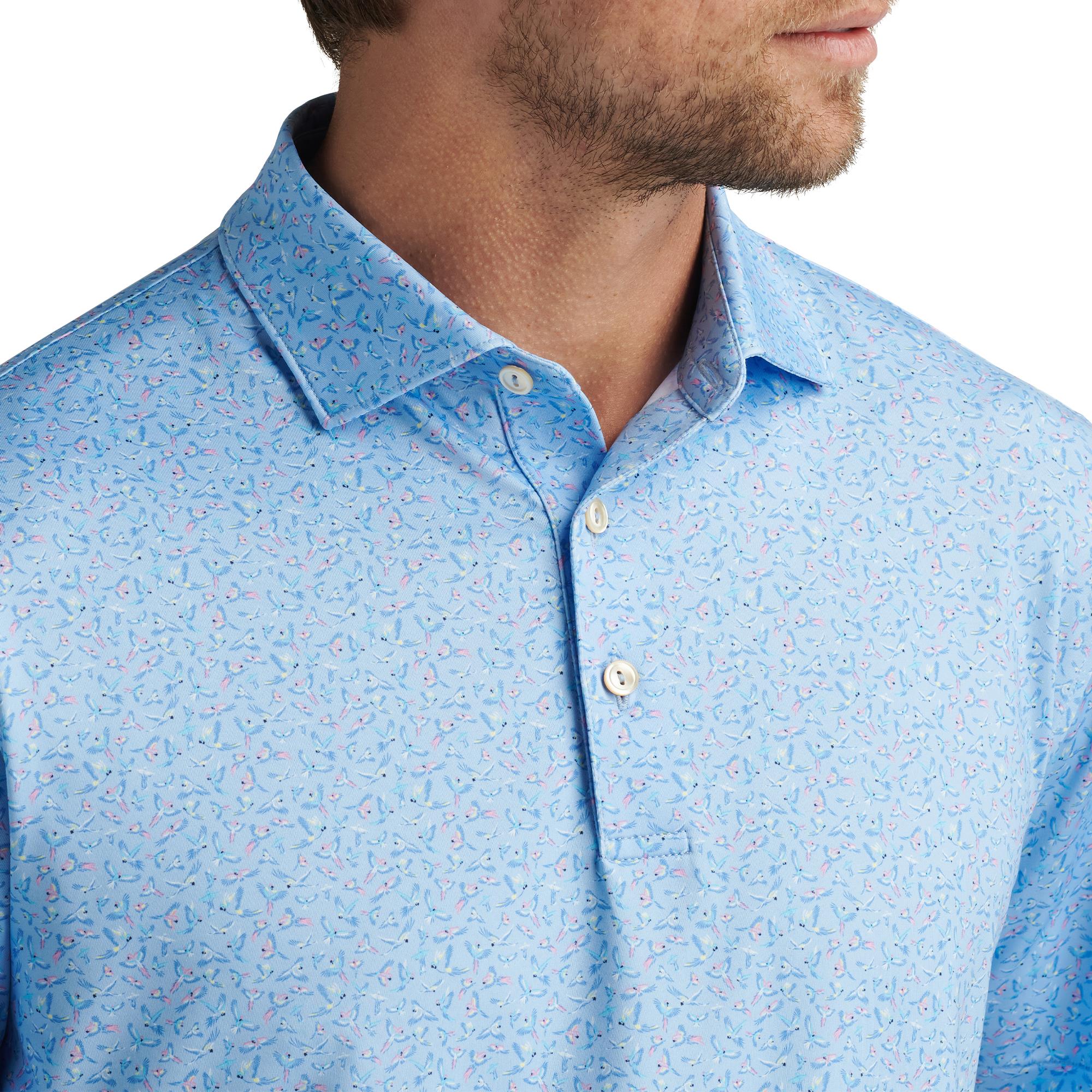 Close-up of collar and buttons on model wearing Peter Millar Macaw Polo Shirt – designer mens golf polo